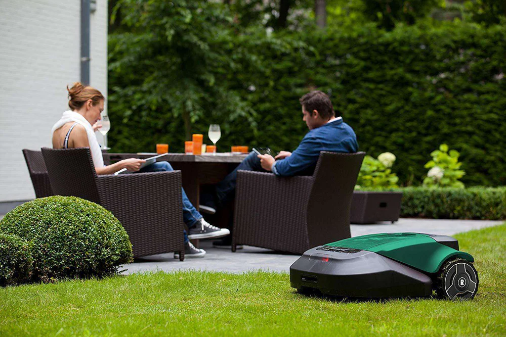 Robot Lawn Mowers Review 2026: Are Autonomous Mowers Worth the Investment? robomow rs622 cutting grass with ai navigation
